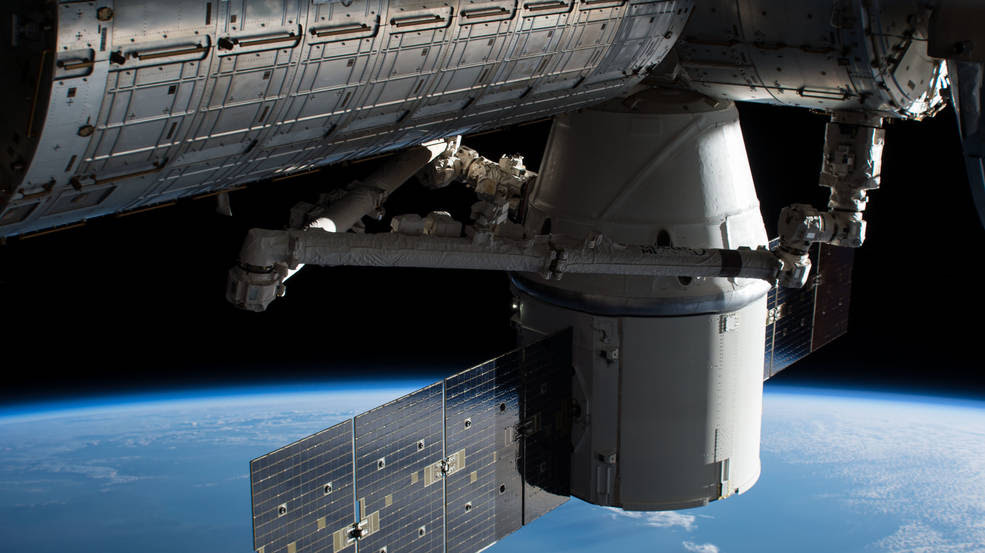 The SpaceX Dragon cargo craft is pictured attached to the Harmony module of the International Space Station after it arrived on Dec. 17. 2017.<br />Credits: NASA