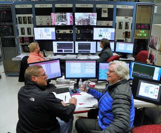 Kilowatt Reactor Using Stirling TechnologY (KRUSTY) control room during the full-power run, Marc Gibson (GRC/NASA) and David Poston (LANL/NNSA) in foreground, Geordie McKenzie (LANL/NNSA) and Joetta Goda (LANL/NNSA) in background.<br /><br />Credits: Los Alamos National Laboratory