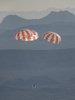 NASA successfully tested the Orion spacecraft’s parachute system on March 16, 2018, at the U.S. Army Proving Ground in Yuma, Arizona, during which engineers integrated a partial system failure into the test protocol for the first time. For its final test on Sept. 12, 2018, an Orion test capsule will be dropped from a C-17 aircraft at an altitude of more than six miles to verify the spacecraft’s complex parachute system provides a safe landing on Earth.<br /><br />Credits: NASA/ James Blair