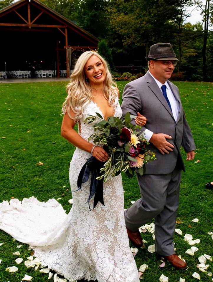 Ashley and dad walking down the aisle.jpg