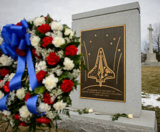 The Space Shuttle Columbia Memorial is seen after a wreath laying ceremony that was part of NASA's Day of Remembrance, Friday, Jan. 31, 2014, at Arlington National Cemetery. Wreaths were laid in memory of those men and women who lost their lives in the quest for space exploration.<br /><br />Credits: NASA/Bill Ingalls
