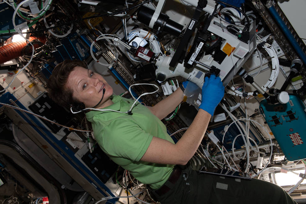 Expedition 58 flight engineer (FE) Anne McClain performing microscope photo operations for Protein Crystal Growth 16 (PCG-16) aboard the International Space Station.<br />Credits: NASA/Anne McClain