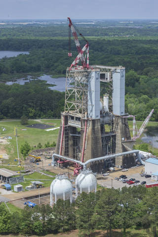 Under a Commercial Space Launch Act agreement, Blue Origin will upgrade and refurbish Test Stand 4670, at NASA’s Marshall Space Flight Center in Huntsville, Alabama, to support testing of their BE-3U and BE-4 rocket engines. Constructed in 1965, Test Stand 4670 served as the backbone for Saturn V propulsion testing for the Apollo program, which celebrates its 50th anniversary this year.<br /><br />Credits: NASA