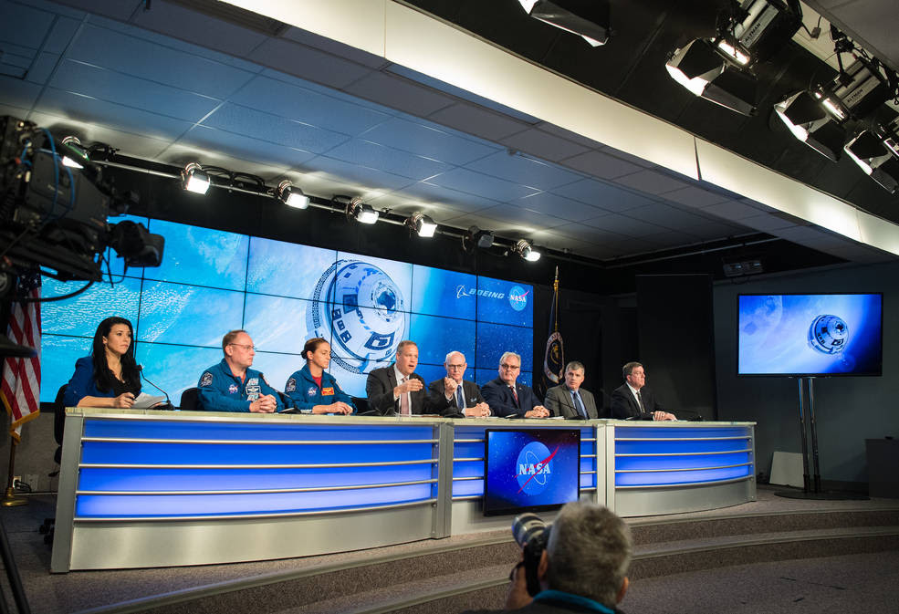 NASA Associate Administrator for Communications Bettina Inclán, NASA astronauts Michael Fincke and Nicole Mann, NASA Administrator Jim Bridenstine, United Launch Alliance President and CEO Tory Bruno, Boeing Space and Launch Division Senior Vice President Jim Chilton, NASA Commercial Crew Program Deputy Manager Steve Stich, and NASA ISS Program Manager Kirk Shireman, participate in a press conference following the launch of Boeing’s Starliner spacecraft onboard a United Launch Alliance Atlas V rocket, Friday, Dec. 20, 2019, at NASA’s Kennedy Space Center in Florida.<br />Credits: NASA/Joel Kowsky