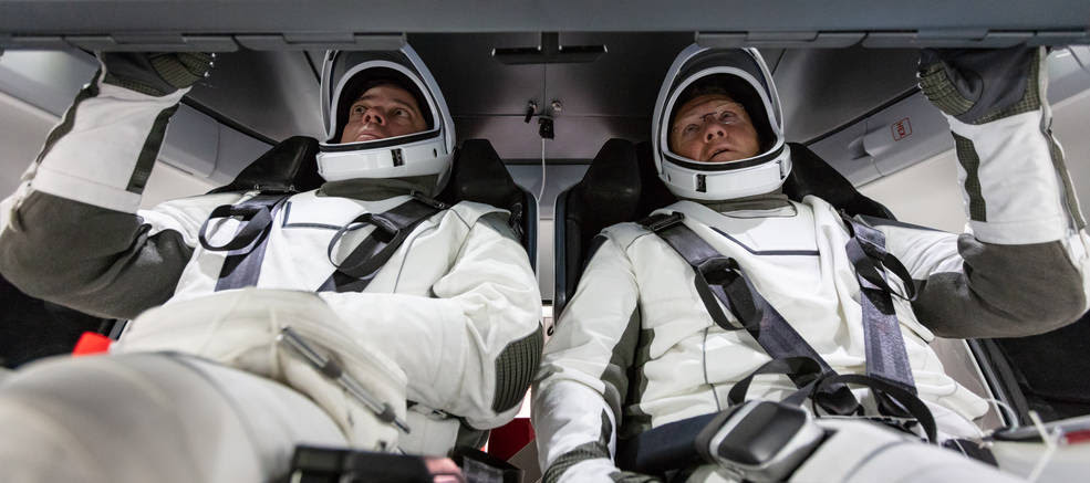NASA astronauts Doug Hurley and Bob Behnken familiarize themselves with SpaceX’s Crew Dragon, the spacecraft that will transport them to the International Space Station as part of NASA’s Commercial Crew Program. Their upcoming flight test is known as Demo-2, short for Demonstration Mission 2. The Crew Dragon will launch on SpaceX’s Falcon 9 rocket from Launch Complex 39A at NASA’s Kennedy Space Center in Florida.<br />Credits: NASA