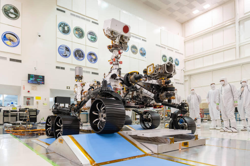 Engineers observe the first driving test for NASA's Mars 2020 Perseverance rover in a clean room at NASA's Jet Propulsion Laboratory in Pasadena, California, on Dec. 17, 2019.<br />Credits: NASA/JPL-Caltech