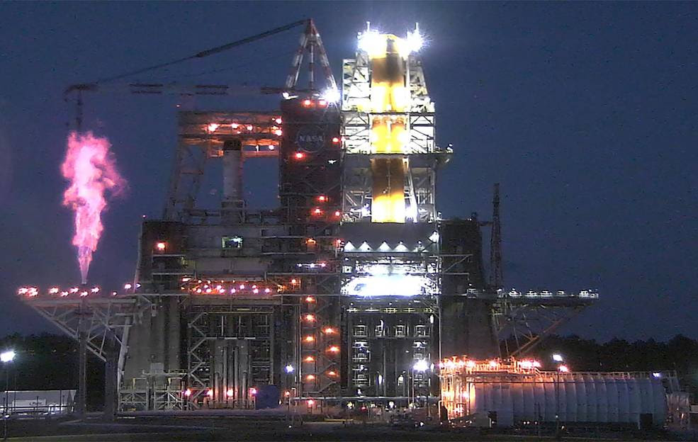 Teams at NASA’s Stennis Space Center will perform a hot fire test of NASA’s Space Launch System (SLS) rocket core stage on Jan. 16, 2021. This image shows liquid hydrogen being safely vented and burned as it naturally warms and boils off during a rehearsal of a countdown to hot fire of the stage’s engines on Dec 20, 2020.<br />Credits: NASA